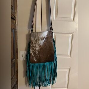 Western single strap cowhide purse!